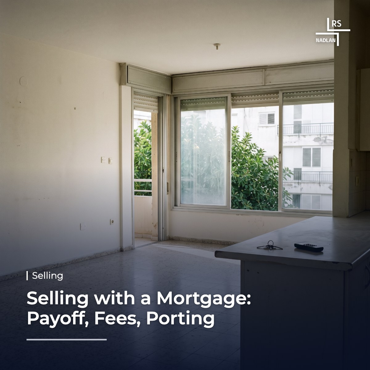 Mortgage documents and a sale contract on a desk in an apartment in north Tel Aviv