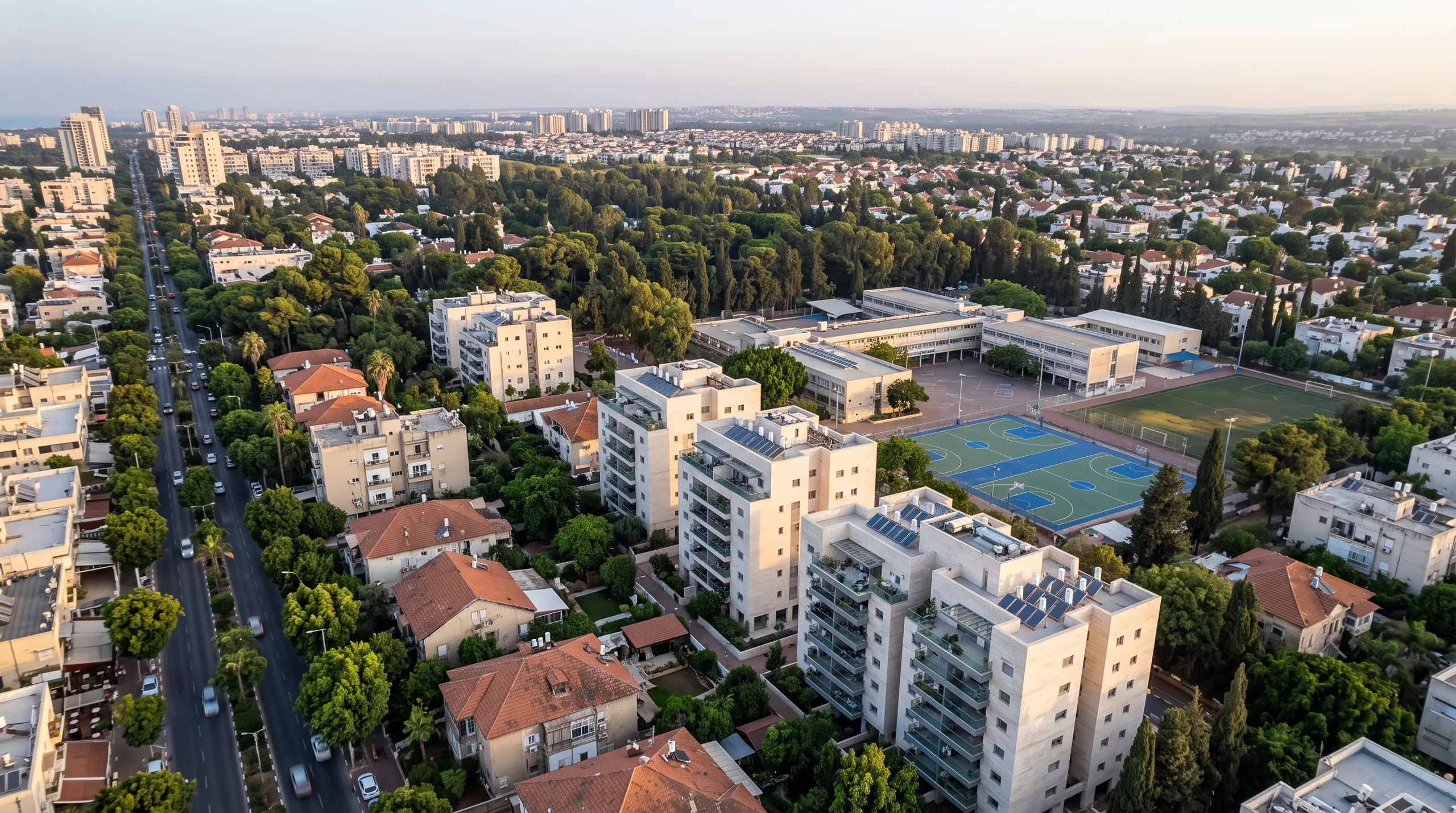 משרד תיווך בשכונת אלון: מבט מלמעלה על גגות הרעפים, הבניינים החדשים וקריית החינוך (הדמיה)