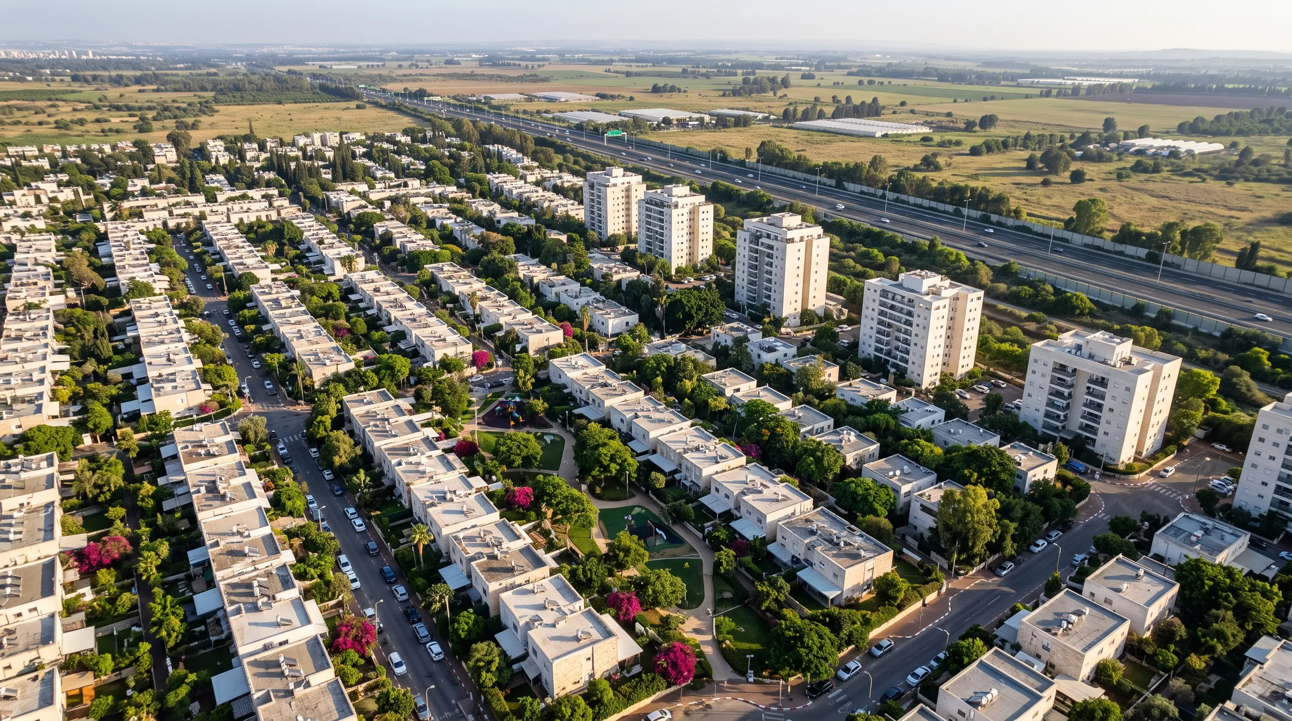 משרד תיווך בנווה רסקו: מבט מלמעלה על שורות הבתים הטוריים, הבניינים וכביש 5 (הדמיה)